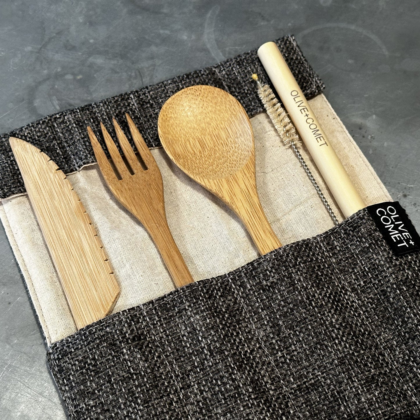 Photo of a Sarita Bamboo flatware set with jute and cotton case