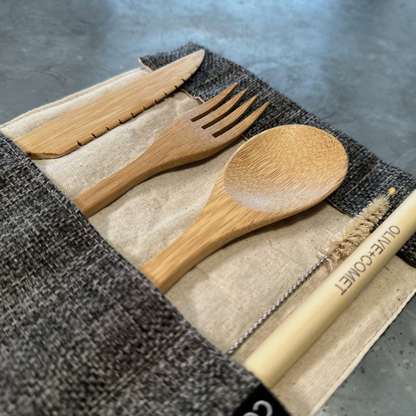 Photo of a Sarita Bamboo flatware set with jute and cotton case