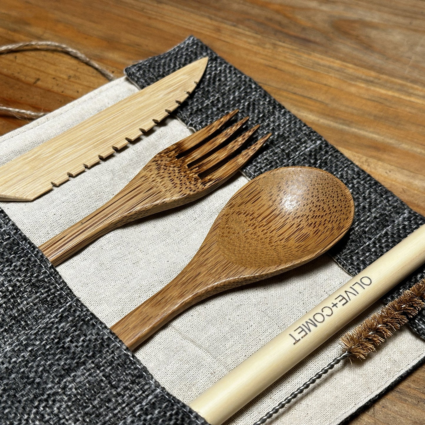 
                  
                    Photo of a Sarita Bamboo flatware set with jute and cotton case
                  
                