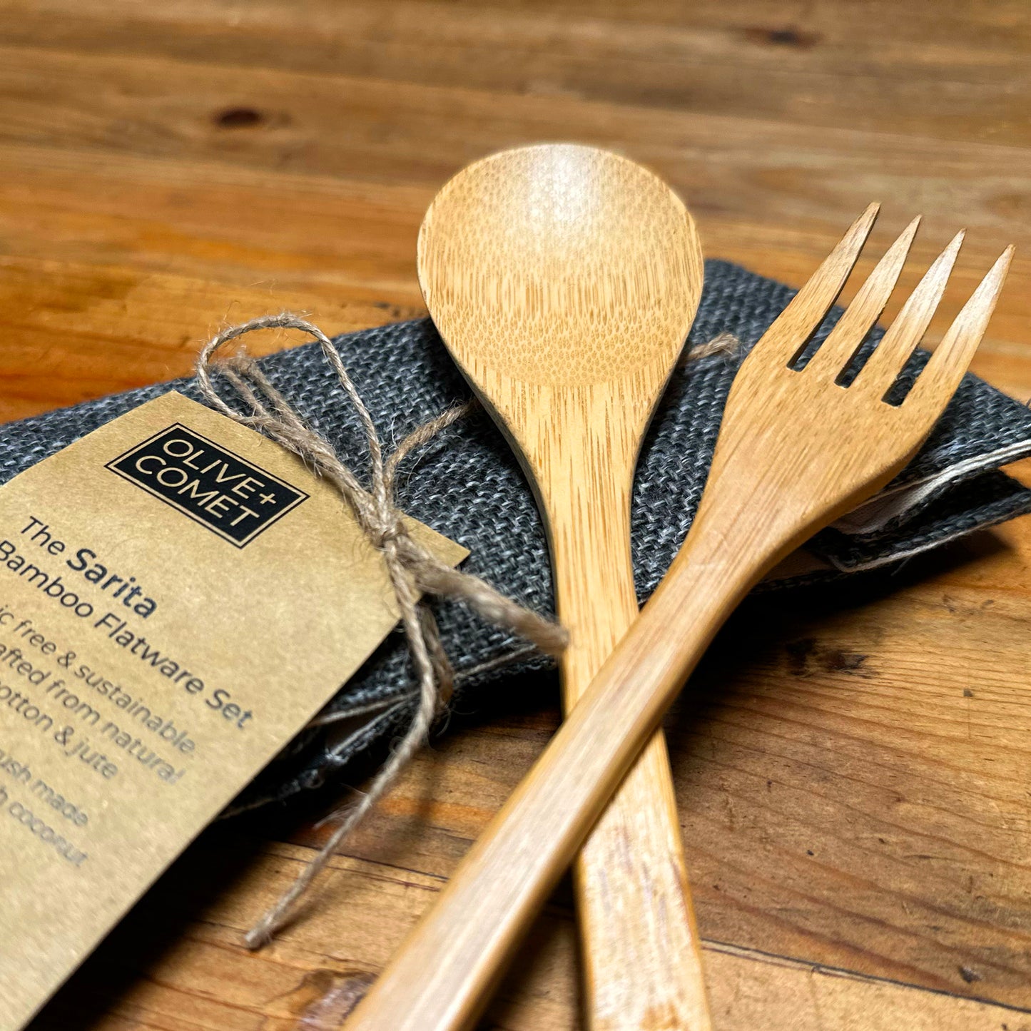 Photo of a Sarita Bamboo flatware set with jute and cotton case